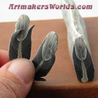 Clay cane More Eagle feathers