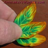 Orange Edge Green Feather polymer clay cane