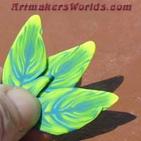 Bright green polymer clay feather cane