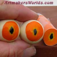 Clay cane Orange Eyeball