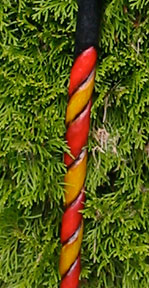 Red and yellow twist hiking stick